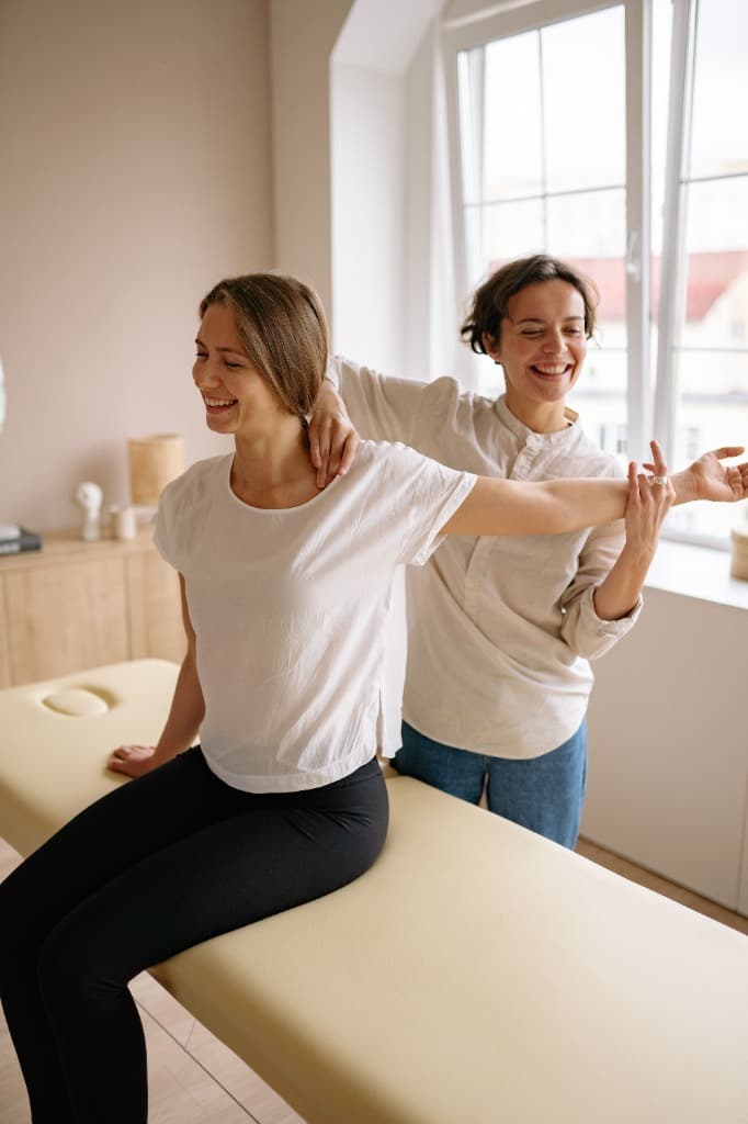 Experienced HCPC-registered home visit physiotherapist helping a patient in the West Midlands